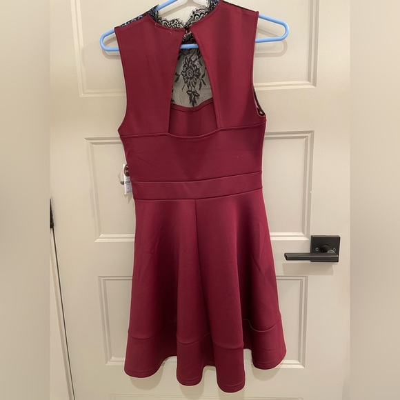 Mini dress with upper lace detailing. New with tags. - Picture 2 of 3
